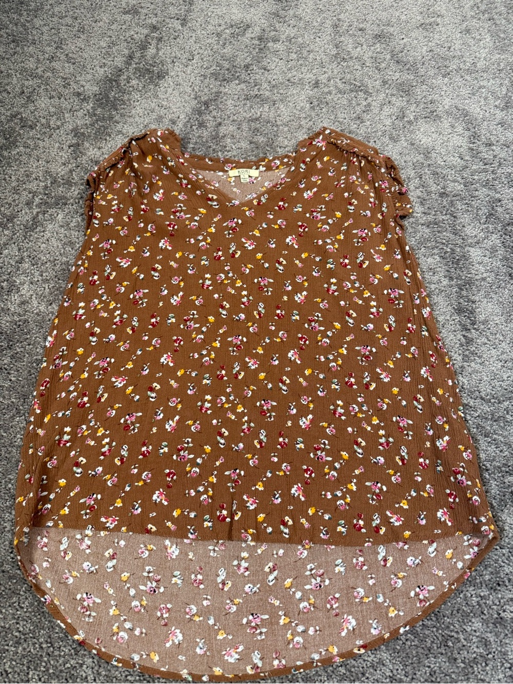 Brown/Tan floral blouse with ruffle sleeves, longer back, and v cut neck Size LG